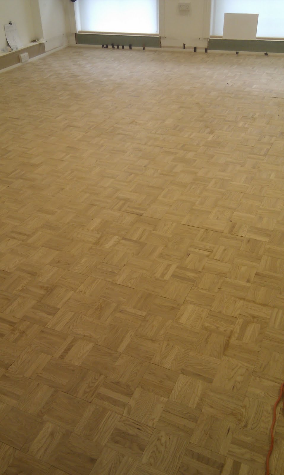 TOM FLOORING Mozaik parkett flooring in the city