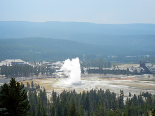 Old Faithful erupting in Yellowstone National Park in Wyoming