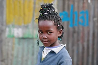 Little girl in the Slums of Kibera Kenya Africa