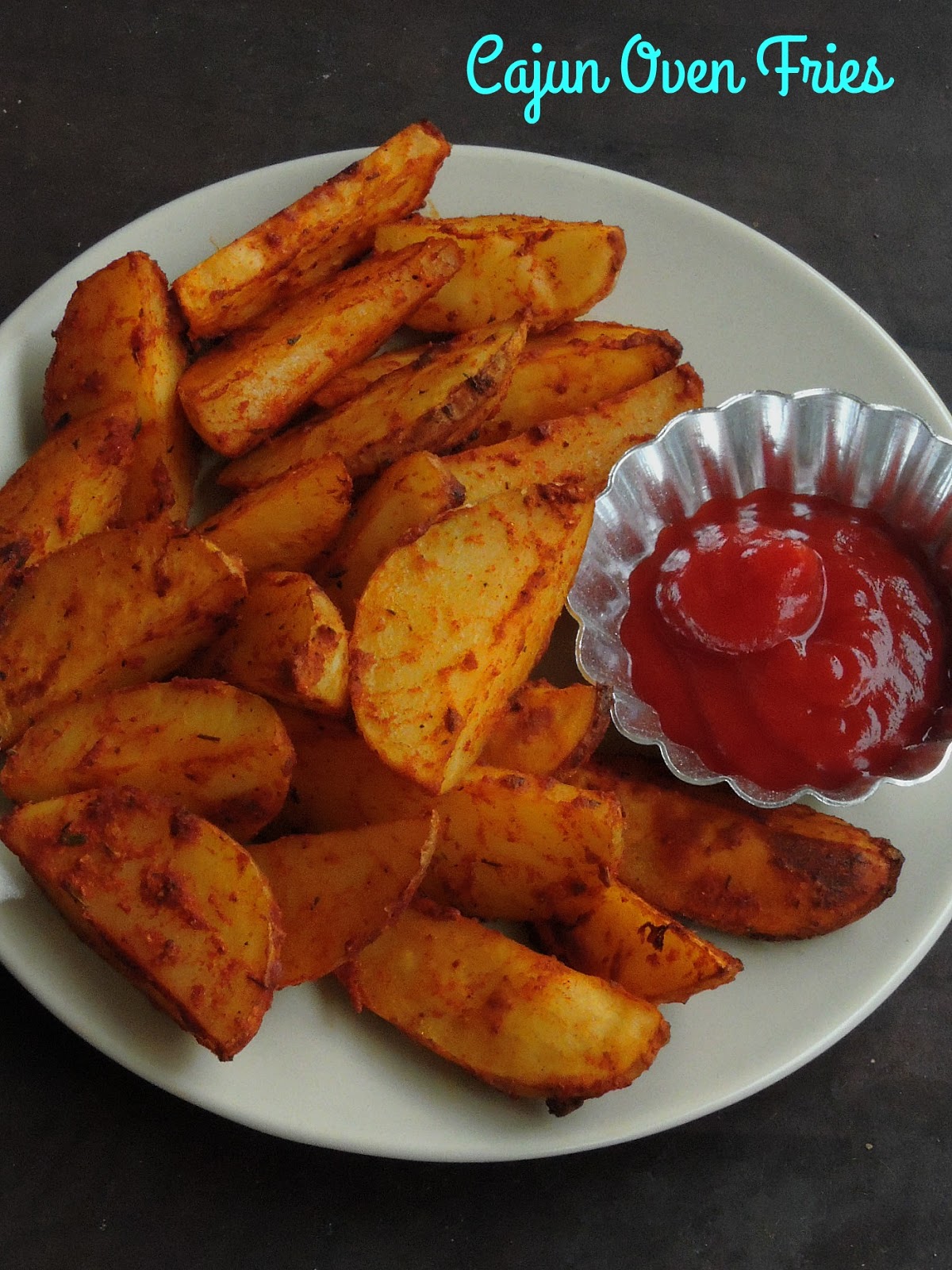 Priya's Versatile Recipes Cajun Oven Fries/Cajun Baked Vegan Potato Wedges