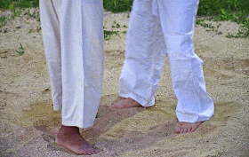 uniforms, legs, feet Okinawa Sumo, wrestlers, sand