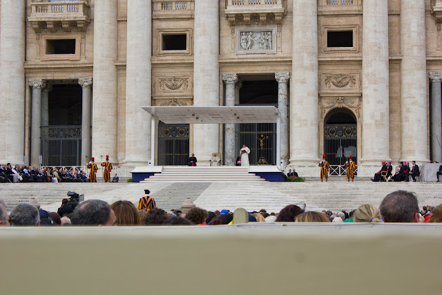 The pope speaking to a crowd in Rome
