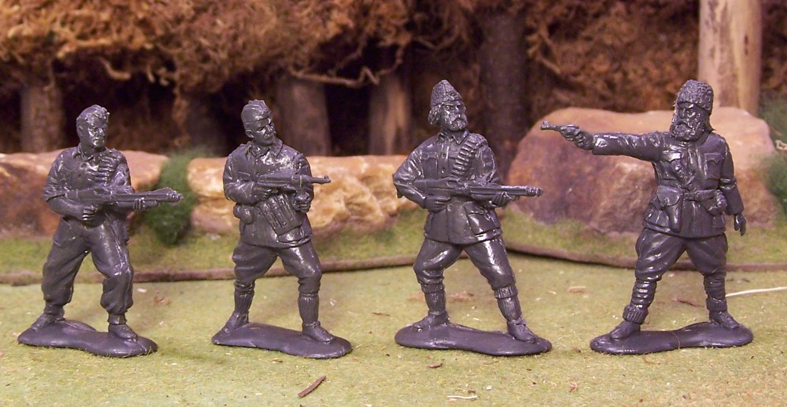 Russian toys soldiers.WW-II.Soviet partisans and Germans.Trees Plastic.