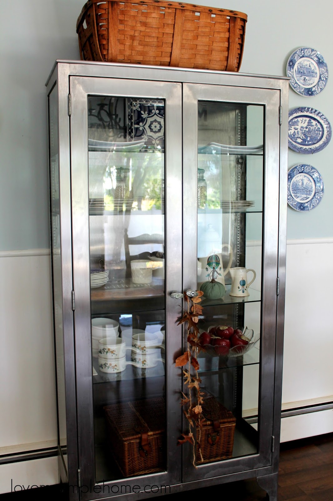 Adding A Touch Of Fall In The Stainless Steel Glass Cabinet Love