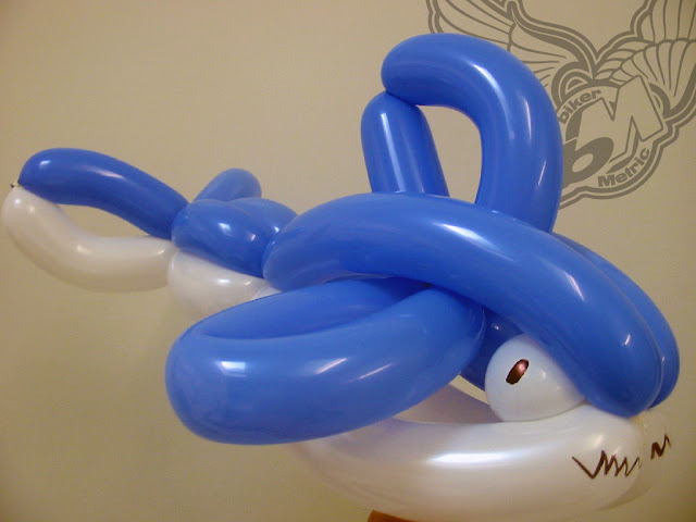 clown made shark balloon