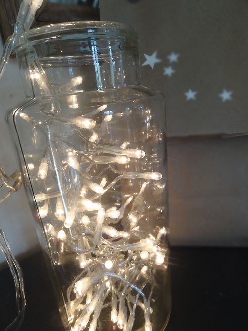 Bote con guirnalda de luces