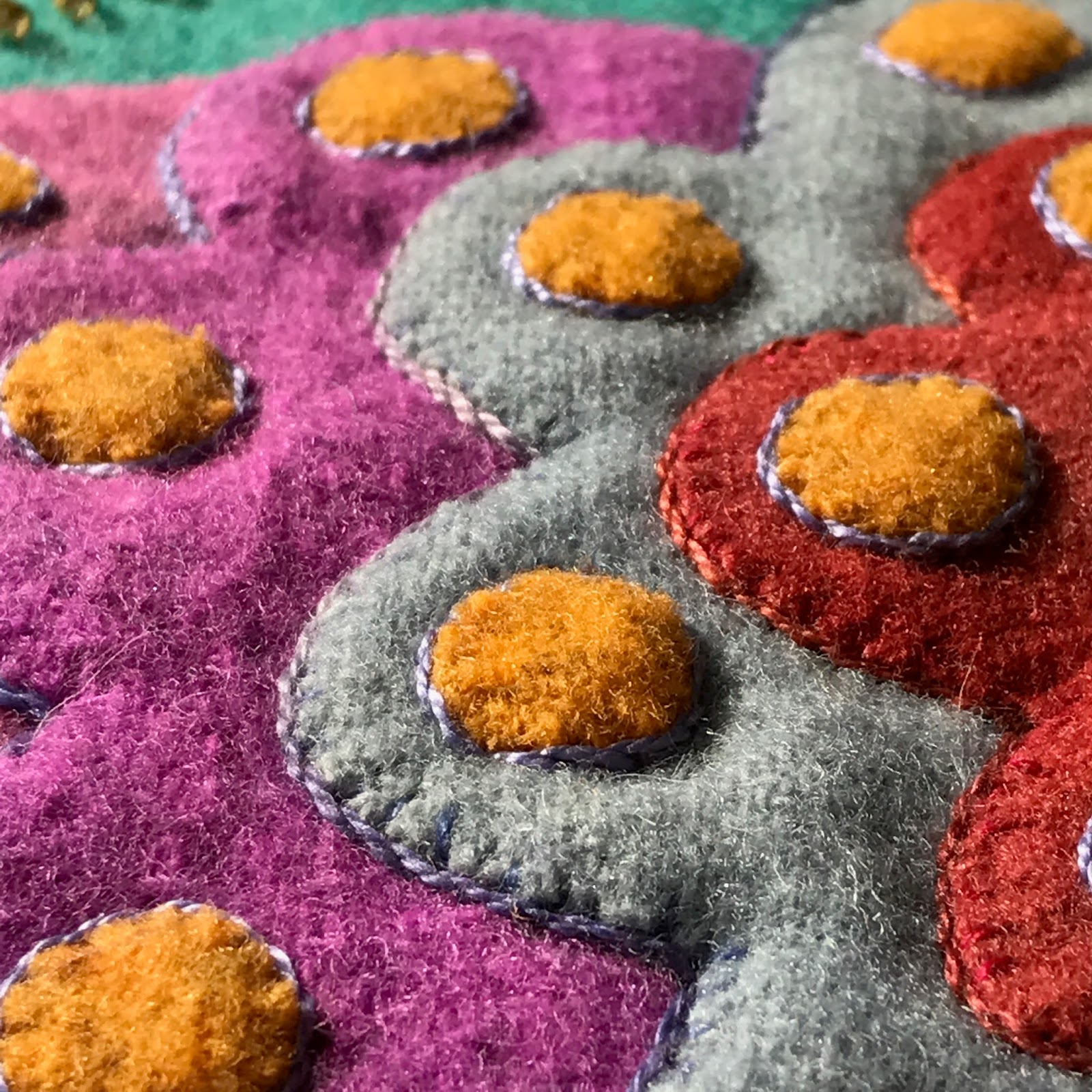 Sherrie loves color! More details on wool applique