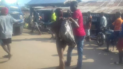 1 Photos: Cable thief beaten to pulp and paraded naked in Mbaitolu, Imo State