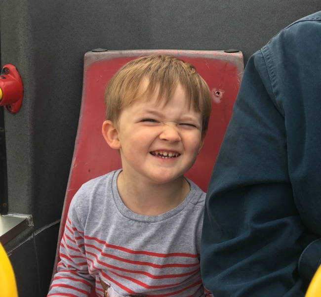 Happy-boy-smiling-on-bus
