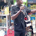Nigerian Police Officer Allegedly Seen Preaching the Word of God at Alaba Market in Lagos (Photos+Video)