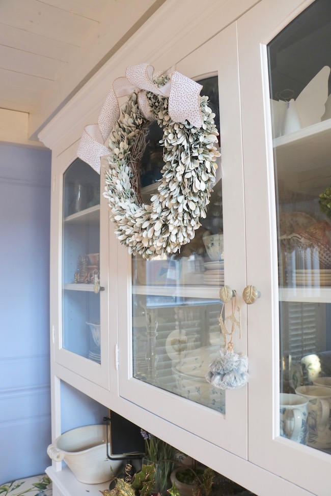 Refresh Boxwood Wreath for Christmas for French Country Style with white spray paint