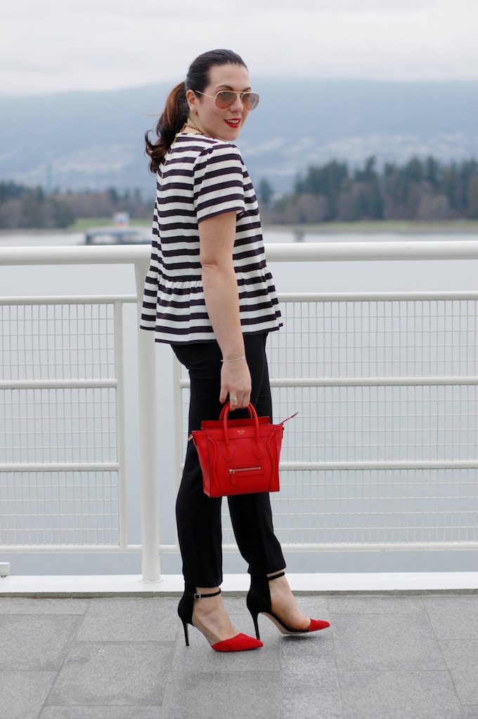 Juicy Couture oversized peplum tee with black and white stripes, Vince silk jogger pants and a Céline Nano handbag Vancouver fashion blogger Covet and Acquire.
