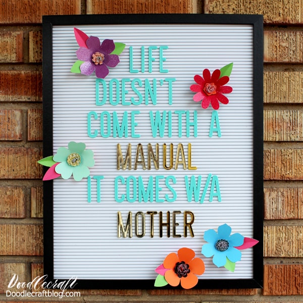 Brightly colored flowers cut with a Cricut Maker made to use on a letterboard with a mother's day quote.