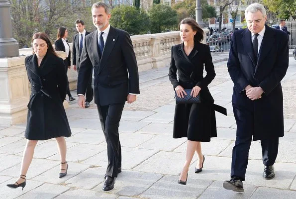 Queen Letizia wore Carolina Herrera black a-line belted coat, Gold And Roses double daga earrings