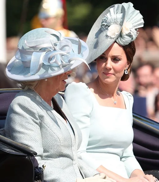 Meghan Markle, The Duchess of Sussex is wearing a dress by Carolina Herrera. The Duchess of Cambridge is wearing a dress by Alexander McQueen. wessex