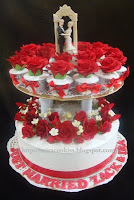 2 tier wedding cupcakes and cake