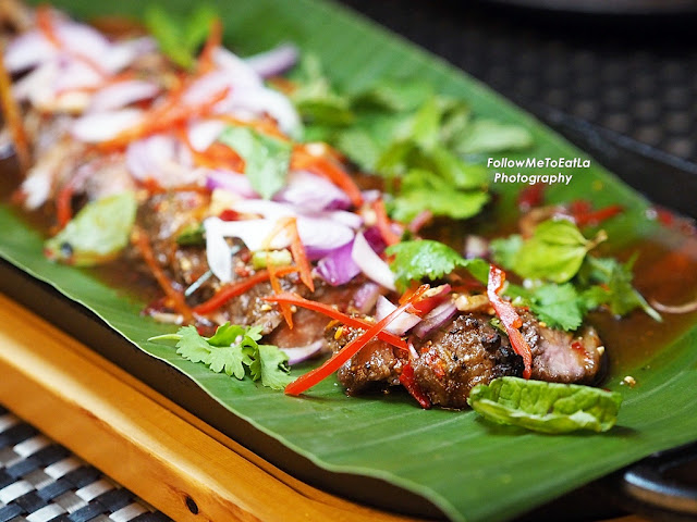 Nam Tok, Grilled black Angus Thai beef salad.