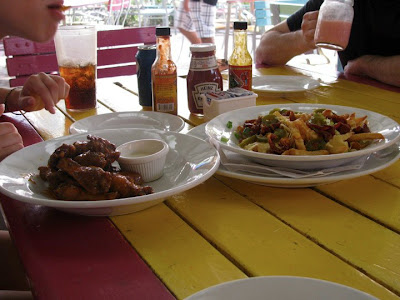 Wings and cheese fries at Smokey Joe's, Aruba