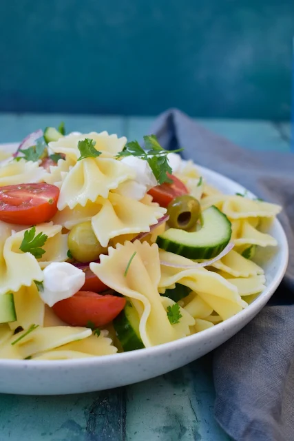 A fresh pasta salad with the flavours of Greece and a zingy dressing.
