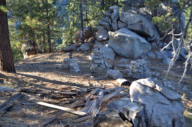 scattered wood and some foundation stuctures