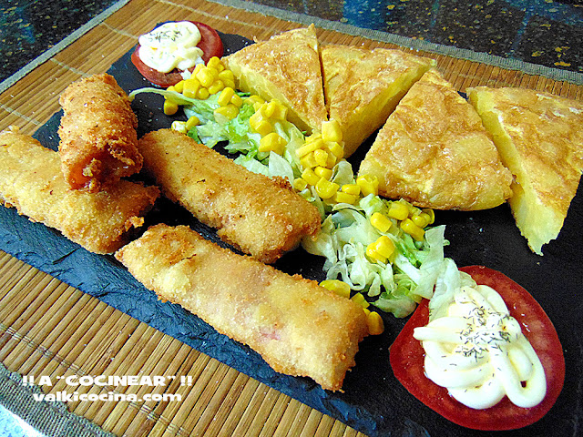 Rollitos de jamón cocido y queso rellenos de pollo