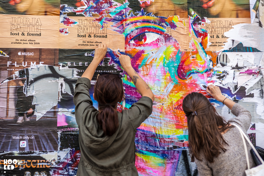 Street Artist Manyoly at work in London, UK. Street Artist Manyoly at work in London, UK. Photo ©Hookedblog / Mark Rigney