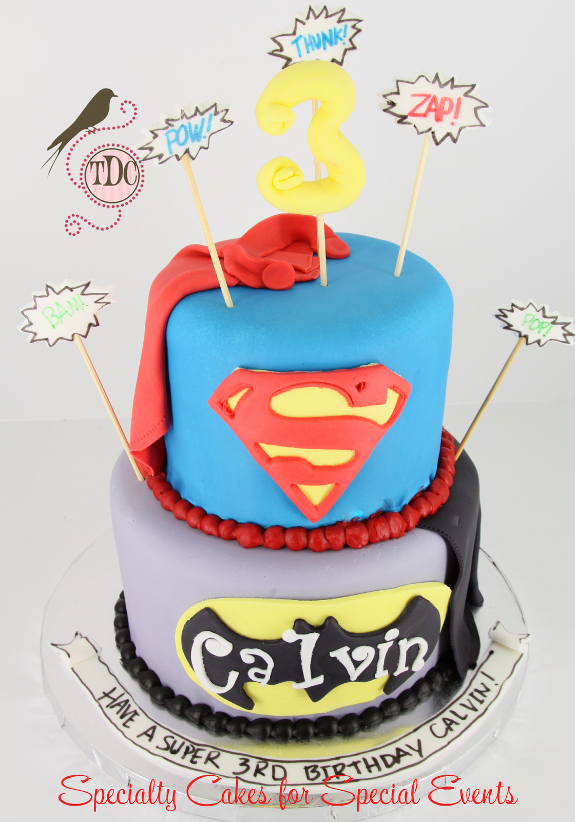 Tastefully Done Super Hero Cape Birthday Cake