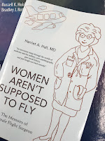 Women Aren't Supposed to Fly, by Harriet Hall, superimposed on Intermediate Physics for Medicine and Biology.