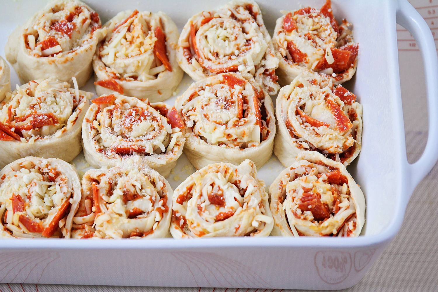 These cheesy and delicious pepperoni pizza rolls are kid-friendly, and so easy to make!