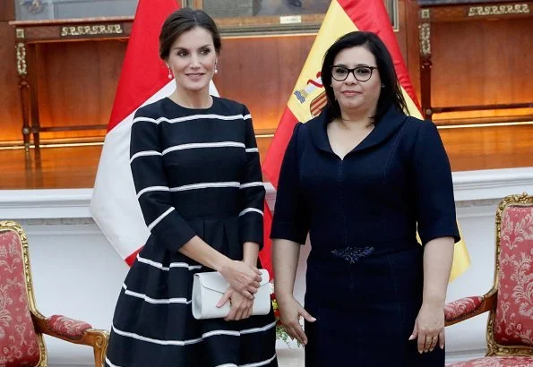 Queen Letizia wore Carolina Herrera striped fit and flare dress. Queen wore a new dress by Carolina Herrera. President Vizcarra and his wife