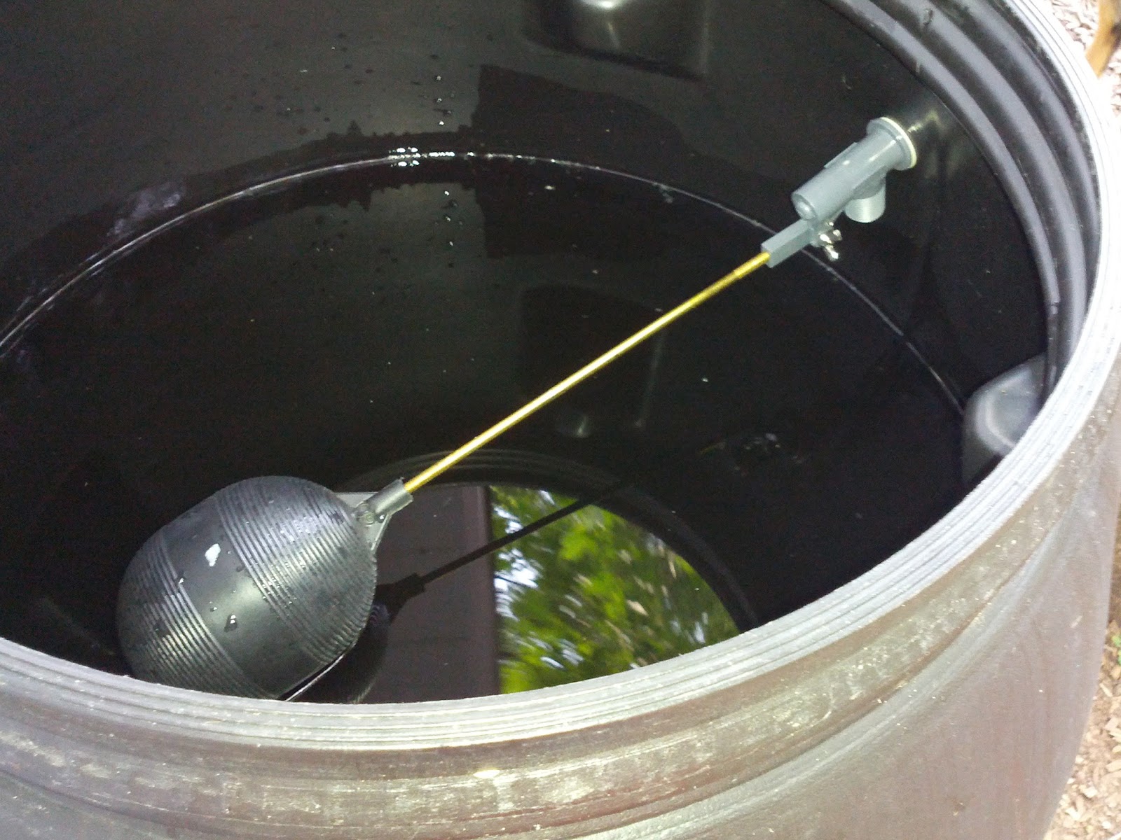 Delete the Nuts: Installing overflow rain barrel #3 -- Part 2
