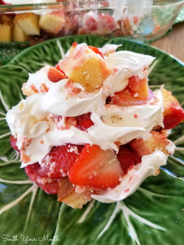 Strawberry Shortcake Dessert! An easy recipe for a Strawberry Shortcake layered dessert made in a 13x9 dish perfect for potluck dinners, cookouts or family gatherings!