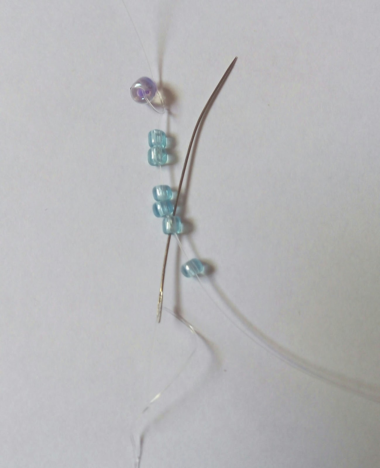 Beadination Beautiful beaded flower using the bead netting technique.