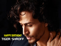 tiger shroff birthday wallpapers whatsapp status video, curly hair actor tiger shroff face photo for your desktop background on this birthday.