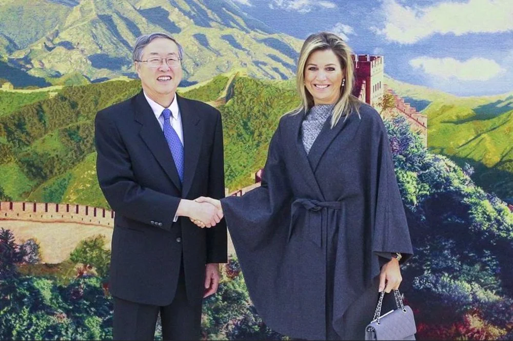 Queen Maxima of The Netherlands meets with officials of the Bank of China, in Beijing, China.