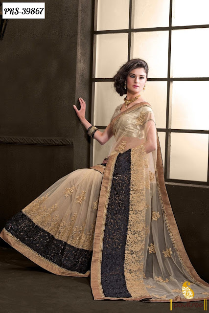 http://www.pavitraa.in/store/designer-collection/beige-net-designer-party-wear-saree/