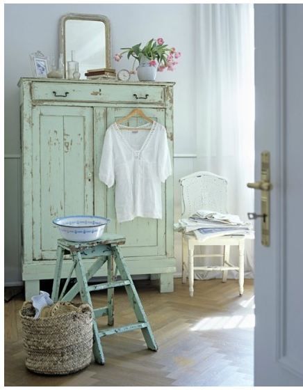 Charming light green painted Swedish antique tall cupboard - found on Hello Lovely Studio