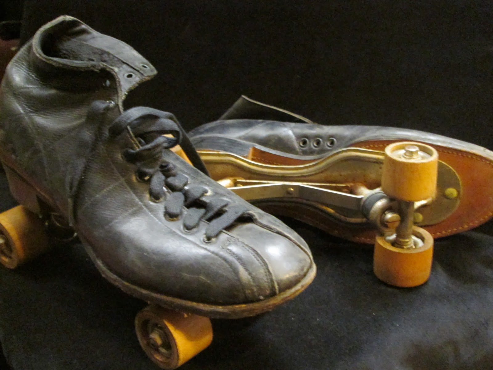 UHURU FURNITURE & COLLECTIBLES SOLD Vintage Roller Skates with Wooden
