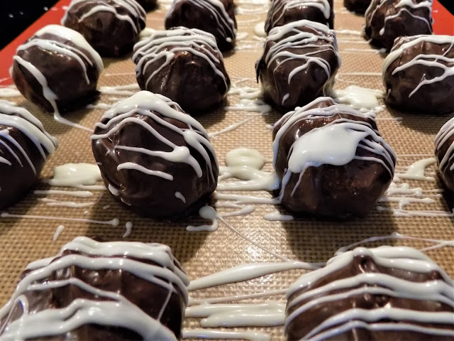 Peanut Butter balls drizzled in white chocolate