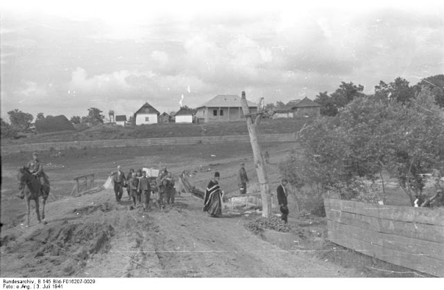 A funeral in Zăicani, Rîșcani, Moldova 3 July 1941 worldwartwo.filminspector.com