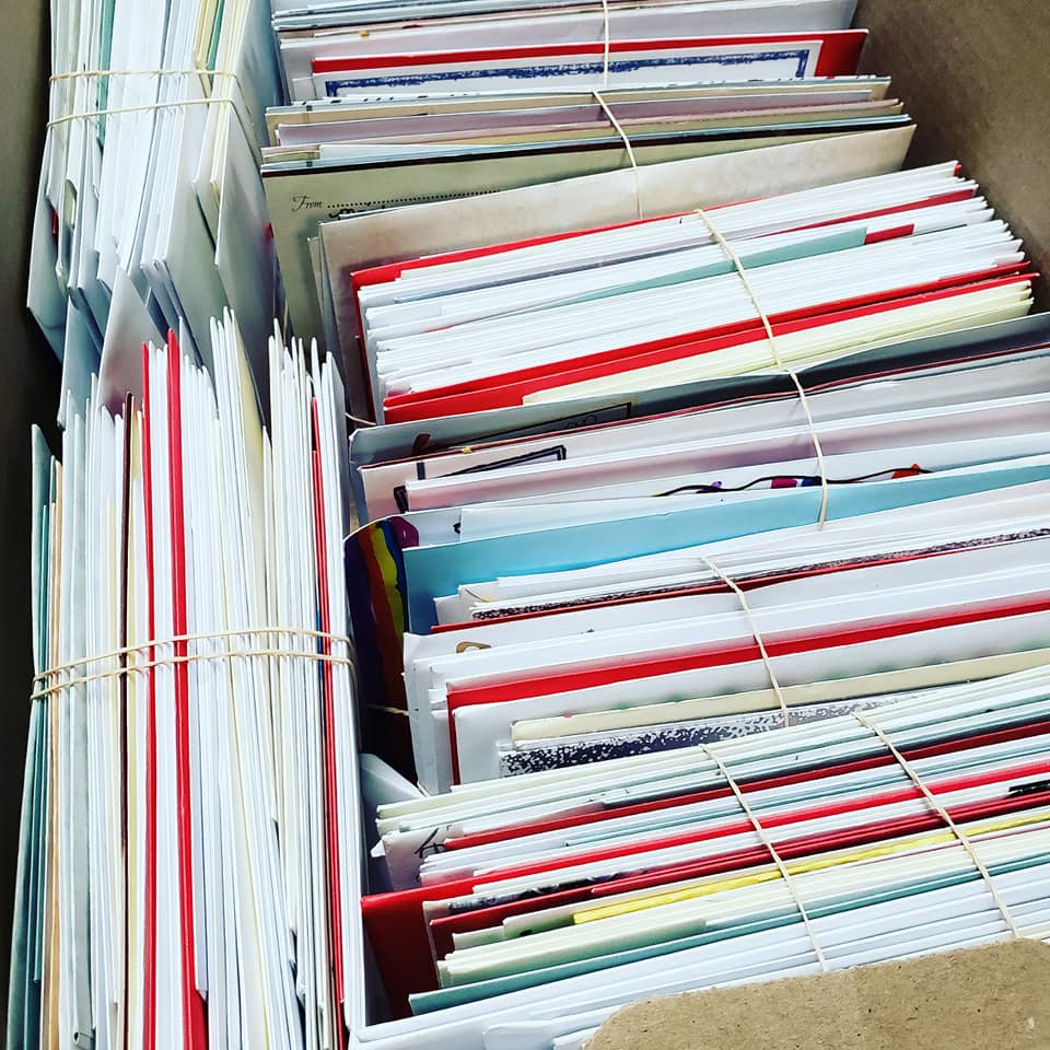 Via her Christmas Card Collective, Erin Schulte collects cards filled with positive messages from across the world for the homeless.