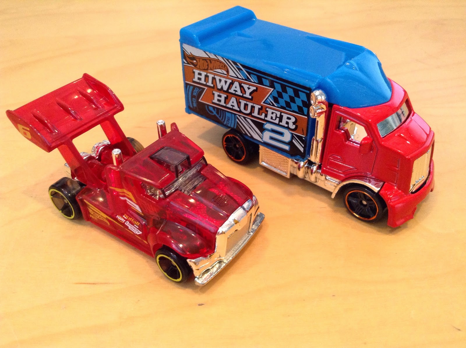 The translucent red truck that looks like its made for drag racing is the R...