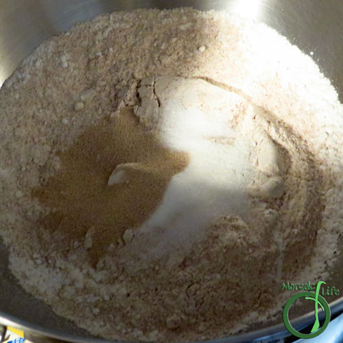 Morsels of Life - Basic Pizza Crust Step 2 - Form Dry Team by combining flour, salt, sugar, and yeast.