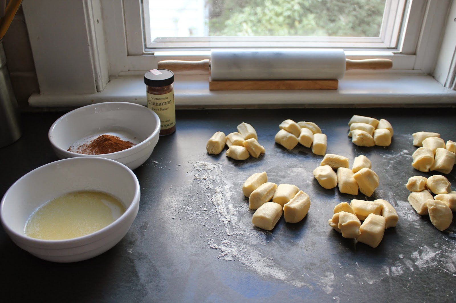 Making cinnamon-sugar brioche buns