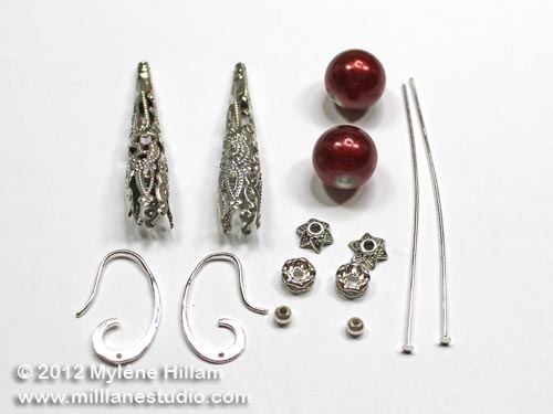 Here are the supplies you'll need to make the Cone Drop Earrings: silver filigree cones, red miracle beads and jewellery findings.