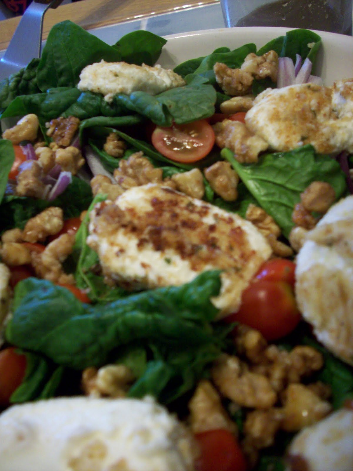 An Eventful Life salad with fried goat cheese medallions