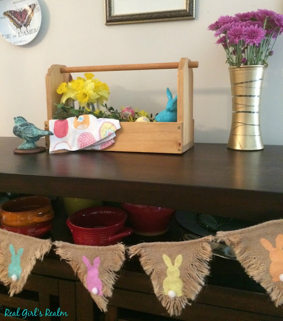 Use Dollar store finds and items from around the house to create a wooden toolbox centerpiece for your Easter decor.