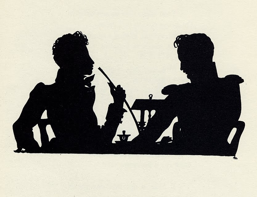 profile silhouette of 2 seated men at a table