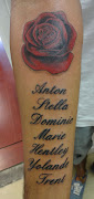 Nathan's Rose & text. Tattoo by Gary (nathan rose text)