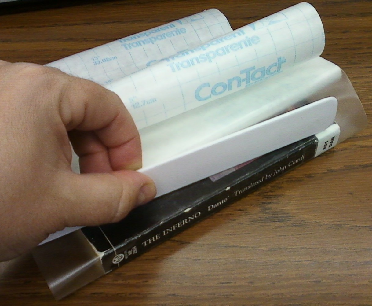 Smells Like Library BOOK PROCESSING Covering Paperbacks With Contact